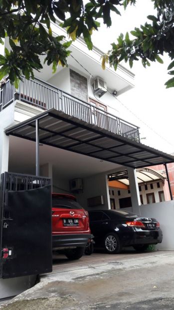 DIJUAL RUMAH EKSLUSIF DI KUKUSAN DEKAT KAMPUS UI DEPOK 